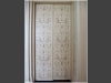 Stencil and free hand accents of a renaissance design on elevator doors in burnt umber and golds